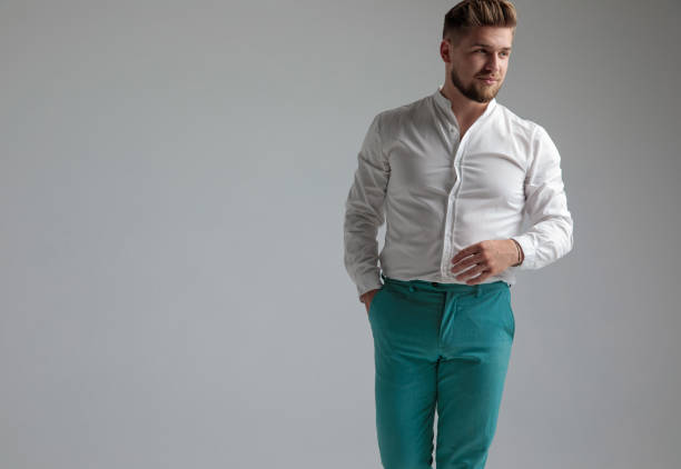 istock chubby attractive man standing with hand in pocket 1153415189