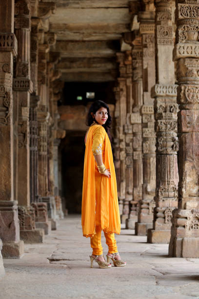 istock Young traditional girl standing portrait 1153415213