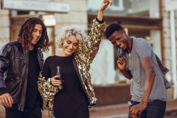 istock Multiracial friends having fun on the street 1153415964