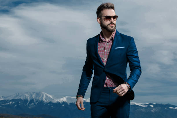 istock Confident man stepping and looking to the side 1153416543