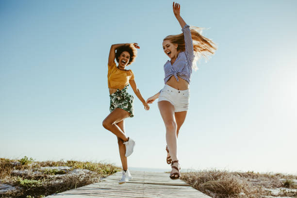 istock Girls enjoying their vacation 1153419092