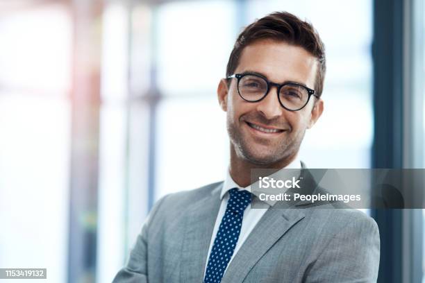 Headshot Portrait Of Smiling Ethnic Businessman In Office Stock Photo -  Download Image Now - iStock