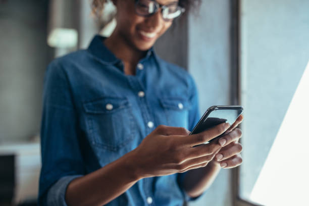 istock Businesswoman using cell phone 1153419503