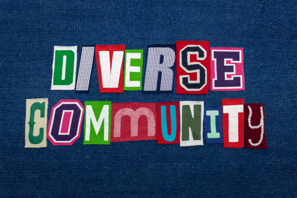 istock DIVERSE COMMUNITY text word collage, brightly colored fabric on blue denim, group diversity concept 1153420990