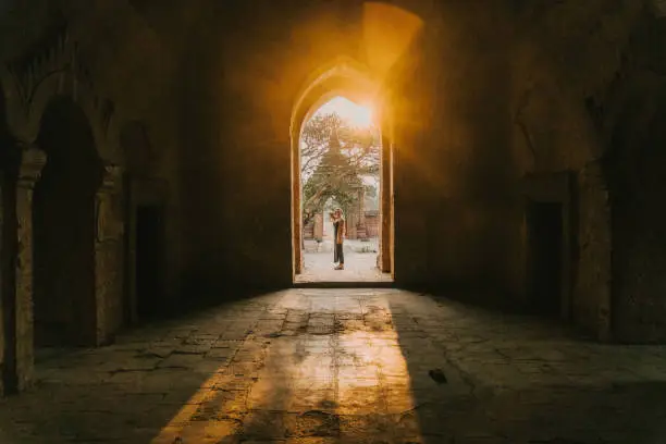 Photo of Woman exploring in Bagan Heritage Site at sunset