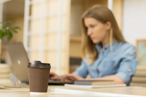 istock Young businesswoman working at the office 1153424481
