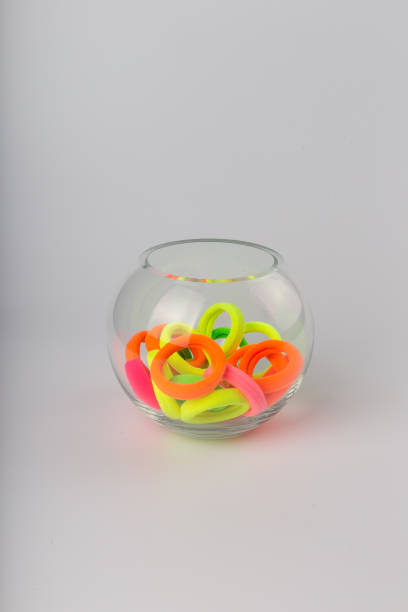 istock Colored bright children's hair ties on a white background 1153424497