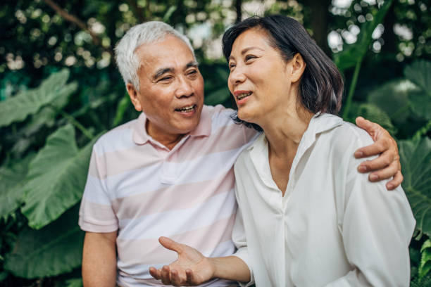 istock Senior couple in park 1153425149