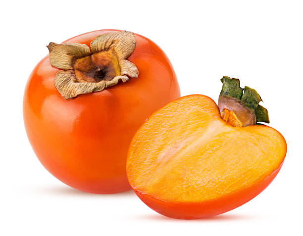 persimmon fruit and one cut in half - persimmon imagens e fotografias de stock