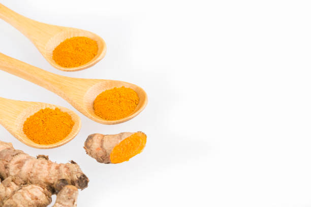 istock Fresh organic root and turmeric powder - Curcuma longa 1153425960