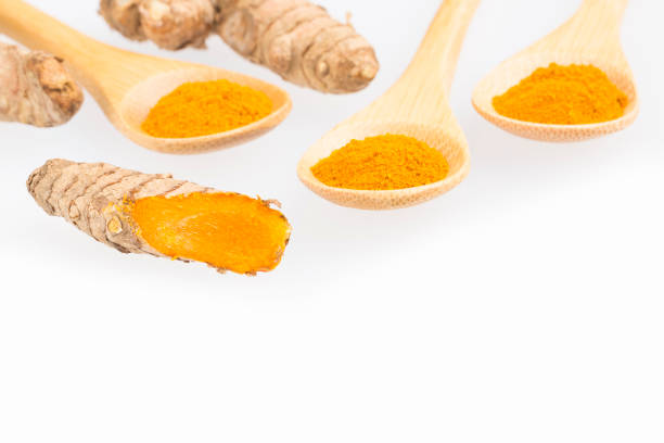 istock Fresh organic root and turmeric powder - Curcuma longa 1153427333