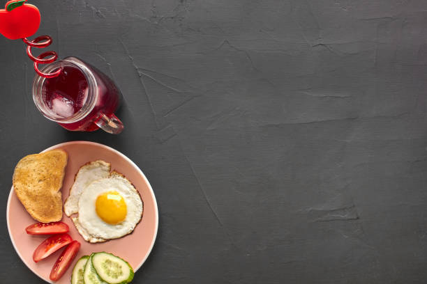 Top view of healthy and delicious breakfast on a black background with copyspace.