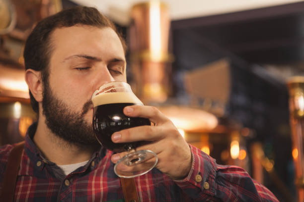 istock Professional brewer working at his beer pub 1153436943