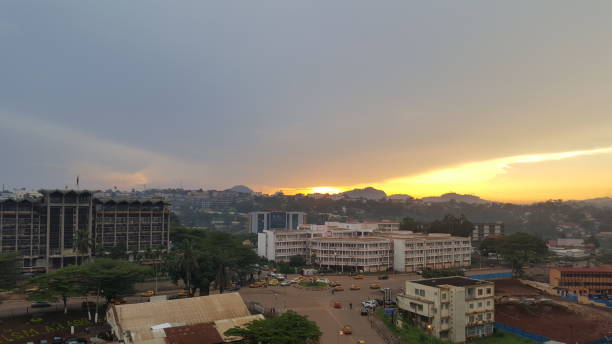 Sunset over Yaounde, Cameroon A view of the sunset over the hilly city of Yaounde, the capital of Cameroon. This photo was taken from the top of the Hilton Hotel in Yaounde. yaounde photos stock pictures, royalty-free photos & images