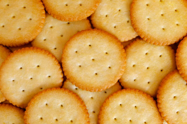 istock Close up group of cracker texture background, Natural flavor biscuit backdrop, Macro crunchy cracker 1153442006