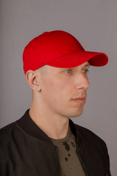istock Handsome young man in a headdress on a gray background 1153442483