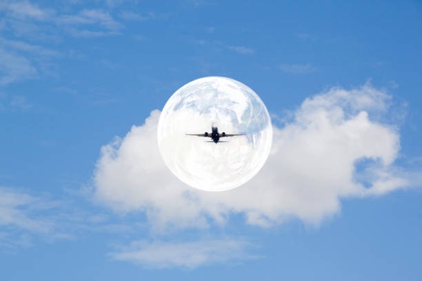 Plane in an air bubble flying in the sky