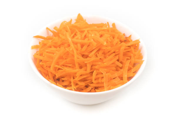 istock Fresh Grated carrot into a white bowl 1153446179