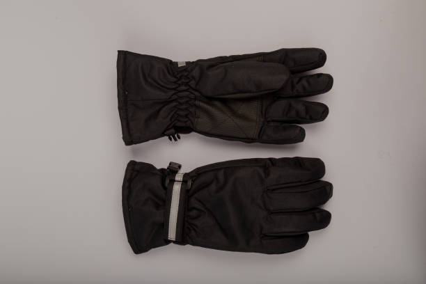 istock Children's winter gloves on a white background 1153449137