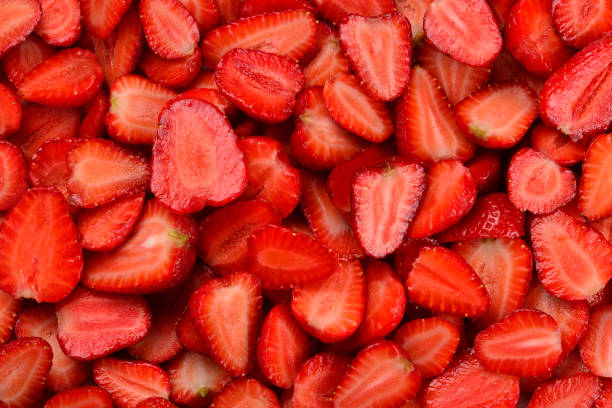 istock Strawberry slices. Fresh berries macro. Fruit background. Top view. 1153450416