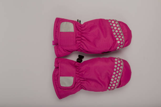 istock Children's winter gloves on a white background 1153450426