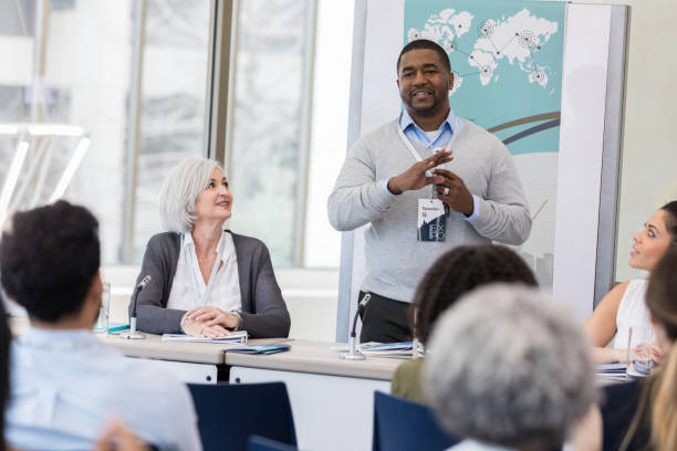 istock Dynamic speaker presents his research on global income inequality 1153450861