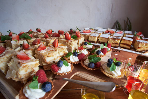 istock amount of small cakes on the open buffet 1153450903