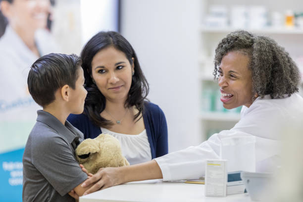 istock Happy female customer talks with young patient 1153450984