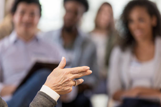 istock Unrecognizable businesswoman gesturing during presentation 1153451052