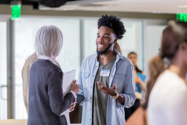 istock Young homeowner talking with homeowner association representative 1153451072