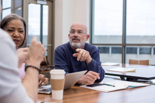 istock Mature adult boss restates point made by employee 1153451621