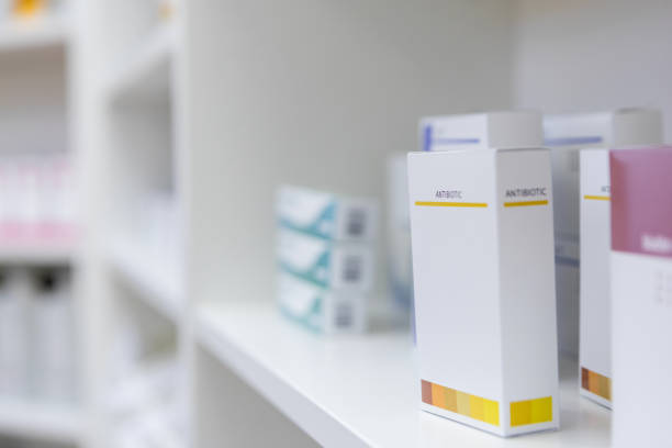 istock Shelf in pharmacy displaying prescriptions 1153451681