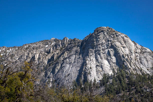 Majestic Tahquitz Peak Beautiful view of majestic Tahquitz Peak on a clear sunny spring day with patches of snow remaining from the winter, Devils Slide Trail, San Jacinto Wilderness, Idyllwild-Pine Cove, California pacific crest trail stock pictures, royalty-free photos & images