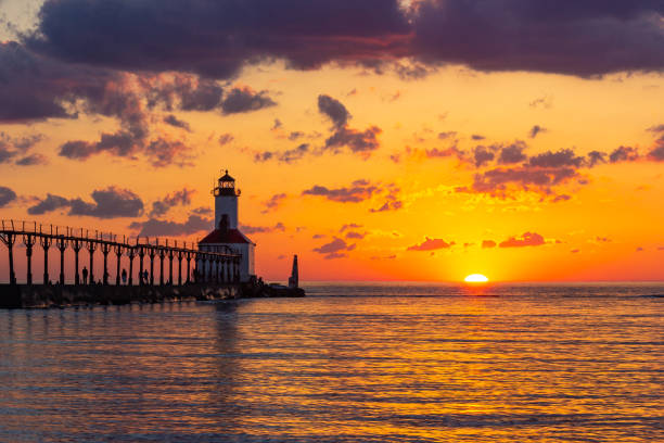 istock Dramatic Sunset at Michigan City East Pierhead Lighthouse 1153452698