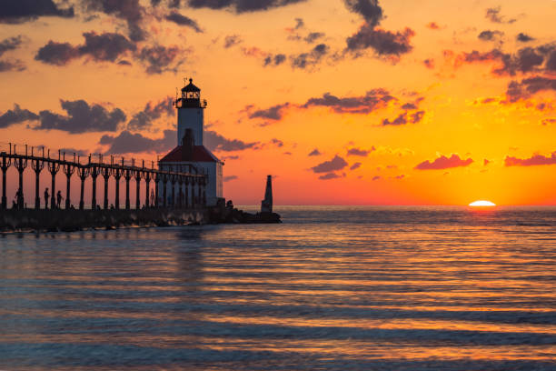 istock Dramatic Sunset at Michigan City East Pierhead Lighthouse 1153452702
