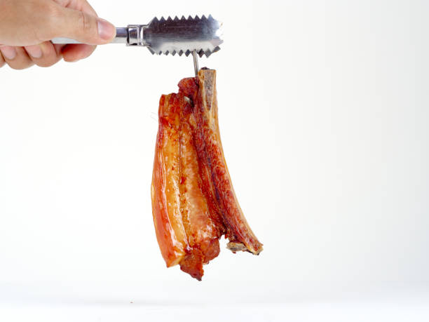 istock Slice belly pork grilled on the white background 1153453633