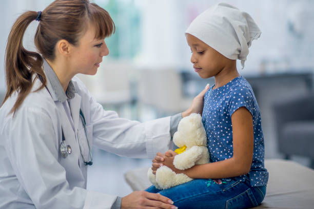 istock Little girl in hospital setting 1153453959