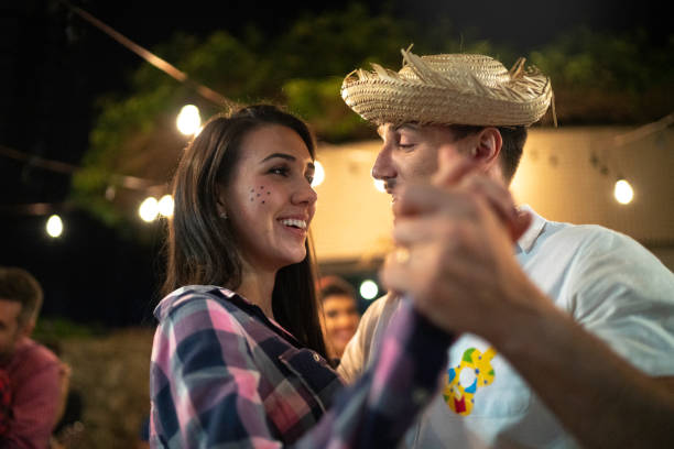 istock Brazilian couple dancing in a camp, Junina party 1153454002