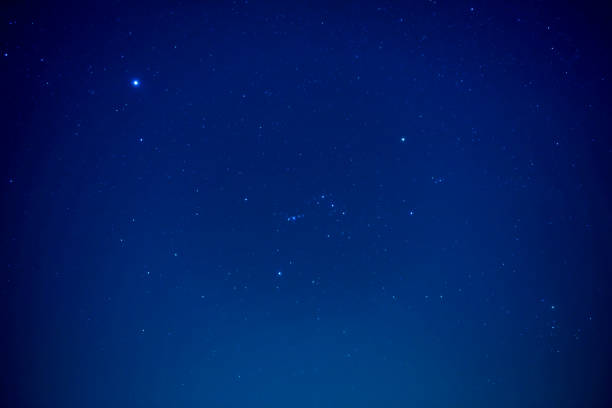 istock Night dark sky with bright stars 1153454038