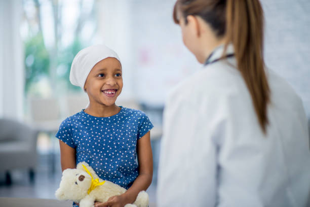istock Little girl in hospital setting 1153454119