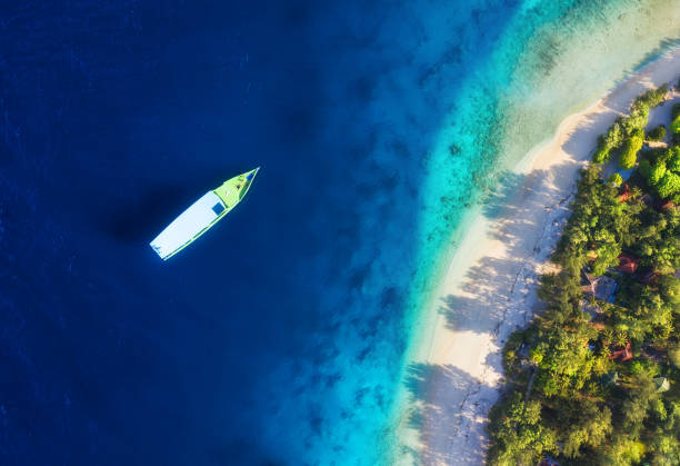 istock Sea coast as a background from top view. Turquoise water background from top view. Summer seascape from air. Bali island, Indonesia. Travel - image 1153454838