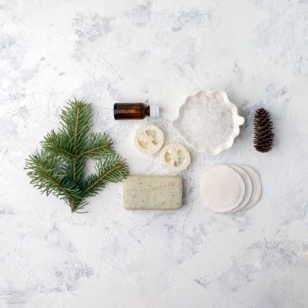 istock Spa treatment on light background. Spa accessories composition on white table. Natural aroma oil, sea salt, sisal, natural soap. Healthy skin care. SPA, zero waste concept 1153456840