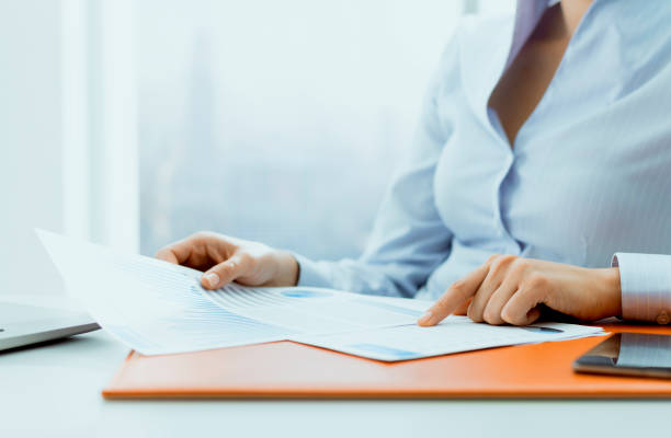 istock Professional corporate manager checking a financial report 1153460223