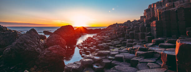 istock Sunset, Giants Causeway, Northern Ireland 1153461448
