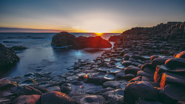 istock Sunset, Giants Causeway, Northern Ireland 1153461466