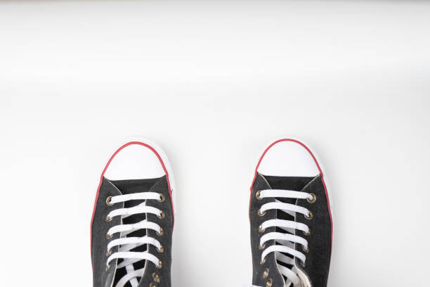 istock shoes with white rubber tip on white background 1153461645
