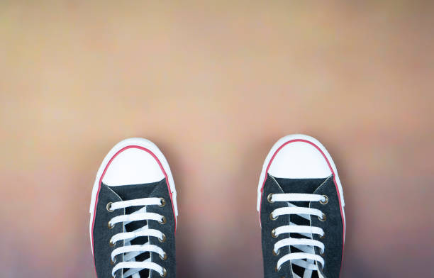 istock shoes with white rubber tip on retro background 1153461863