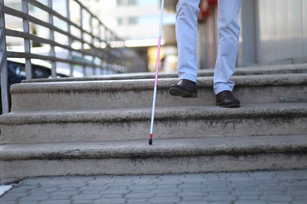istock Young beautiful bearded man with walking sticks on the stree 1153462309