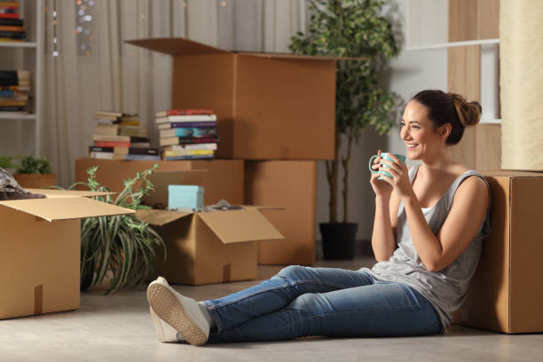 istock Happy tenant resting drinking coffee moving home 1153463571