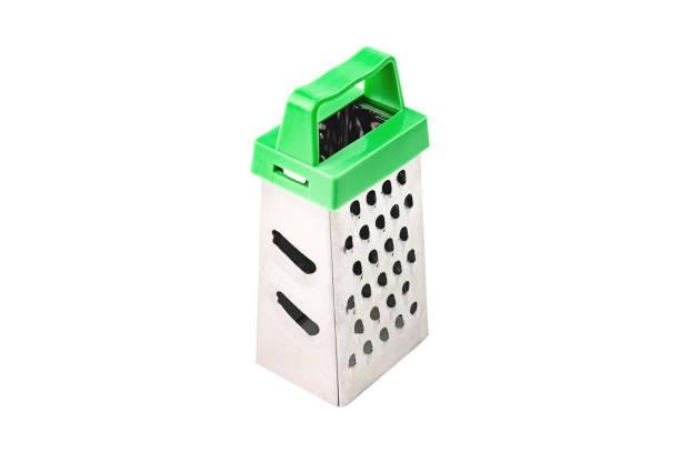 istock One clean glossy metal sharp grater with green plastic handle for different products for cooking isolated on white background 1153465251